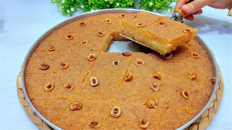 طريقة عمل البسبوسة بالمكسرات بطعم أحلى من المحلات