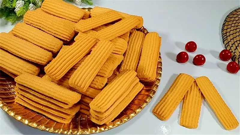 حلويات عيد الفطر 2025 ..  طريقة عمل بسكويت البرتقال اللذيذ