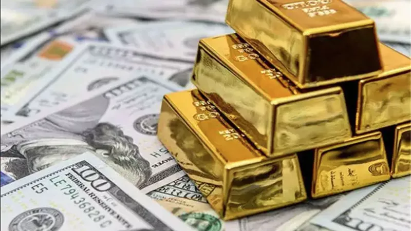 العلاقة بين سعر الذهب والدولار الأمريكي