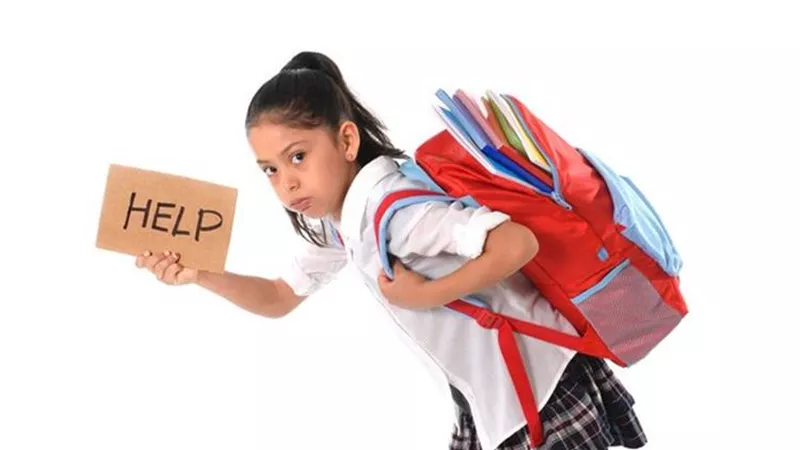 7 شروط لحماية ظهر طفلك من شنطة المدرسة