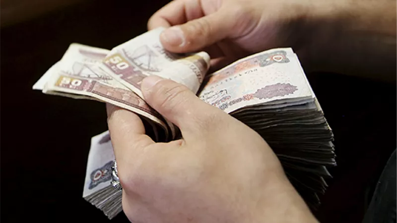 حكم الاقتراض من البنك لشراء شهادات استثمار