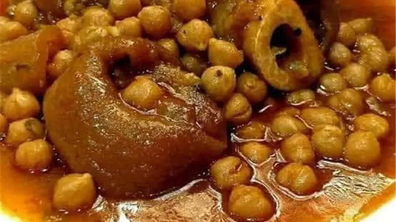   لغداء شهي ومفيد، طريقة إعداد طاجن الكوارع بالحمص بخطوات بسيطة